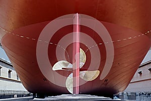 Propeller Close up and Repair Cargo ship in floating dry dock.