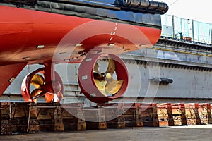 Propeller Close up and Repair Cargo ship in floating dry dock.