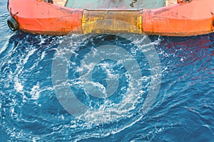 Propeller wash of an anchor handling tug boat