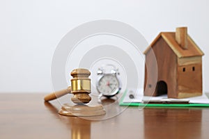 Property auction, Gavel wooden and model house on wtite background, lawyer of home real estate and ownership property concept