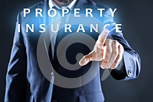 Property insurance concept. Man using virtual screen, closeup