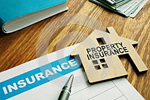 Property insurance stamp on a model  home photo