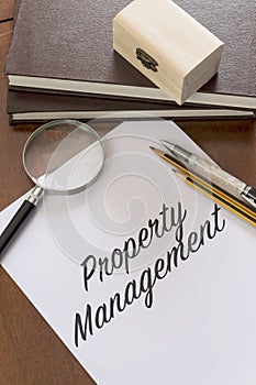 Property management writen on paper photo