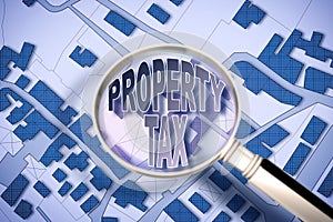 Property Tax concept image against an imaginary city map with a magnifying glass