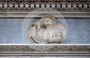 Prophet Amos, relief on the portal of the Cathedral of Saint Lawrence in Lugano photo