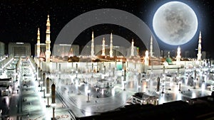 Prophet's Mosque with full moon at night