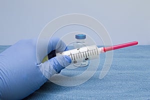 Propofol Syringe in Left Hand