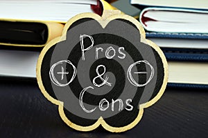 Pros and Cons is shown on the conceptual business photo