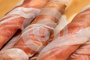 Prosciutto crudo detail close-up photo