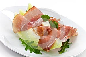 Prosciutto di Parma ham and three slice of melon