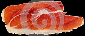 Prosciutto Dry Cured Pork Ham Slice Isolated On Black Background