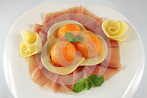 Prosciutto ham, melon and cheese