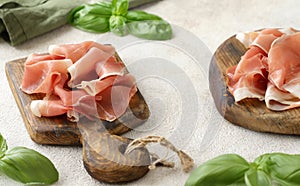 prosciutto ham on a wooden board