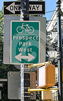 prospect park west bike lane sign close up (two way cycling path for biking) one way, traffic light