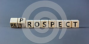 Prospect or retrospect symbol. Turned a cube and changed the word `retrospect` to `prospect`. Beautiful grey background. Busin photo