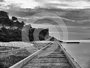Prospective black and white walking walk along a stretch of the