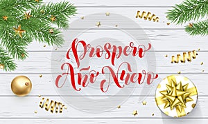 Prospero Ano Nuevo Spanish Happy New Year golden decoration and calligraphy font on white wooden background for greeting card. Vec photo