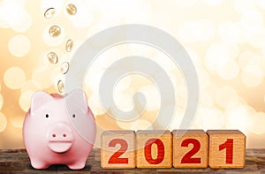 Prosperous New Year 2021 With Piggy Bank and Wood Cube Blocks, Copy Space