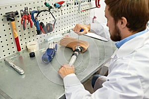 Prosthetist Making Artificial Leg