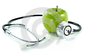 Protect your health with healthy nutrition.Stethoscope, apple