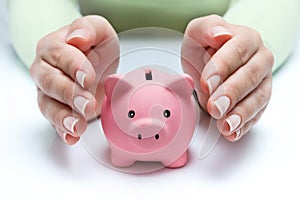 Protect your savings - with hands and piggy bank