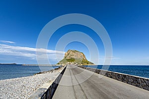 Protected ancient fortress on island rock Monemvasia, view from mainland, Peloponnese treasures, Greece