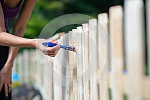 Protecting wooden fence with varnish photo