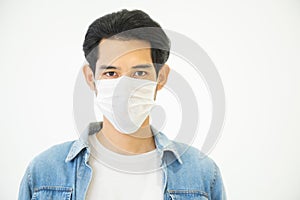 Protection against contagious disease, coronavirus.Asian Man wearing hygienic mask prevent infection,airborne respiratory illness