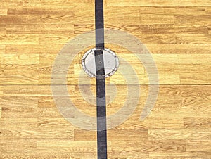 Protection circle cap of a electrical outlet in wooden floor
