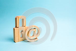 Protection of data and personal information. Hacking attack, hacking, viruses. Reliable post. The email symbol and the lock