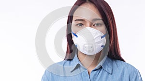 Protection flu outbreak air pollution pm2.5 healthcare concept. Young woman wear face mask n95 on own mouth infection