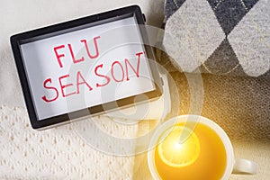 Protection from the flu season - warm woolen clothing and lot of hot drinks.