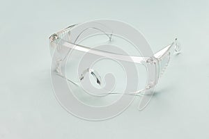 [Protection medical] protective glasses isolated on a Light blue background