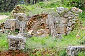 Protection preservation and enhancement of the great retaining wall and the votive podestals at the sanctuary of Amphiaraus of