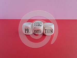 Protection and prevention symbol. Concept word Protection Prevention on wooden cubes