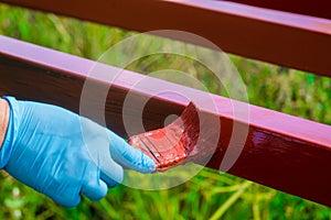 Protective coating of steel closed profiles with primer iron oxide red