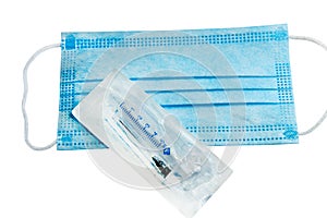 Protective face mask and syringe