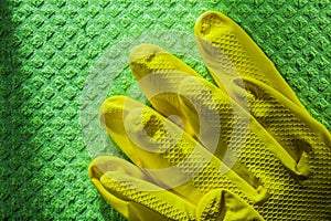 Protective gloves on cleaning washcloth