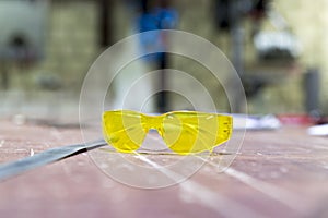 Protective goggles in metal workshop