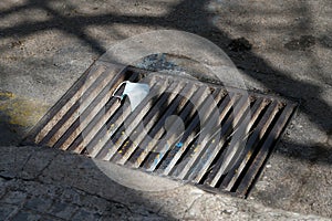 A protective mask seen thrown on a sewer in Palma de   Mallorca during the COVID-19 outbreak