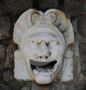 This is a protective mask of stone on the top of the Monselice Castle entrance, built up between the 11th and the 16th century