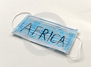 Protective medical mask with inscription Africa. Epidemia in Africa. Wuhan Coronavirus, 2019-nCoV photo