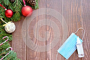 Protective medical mask layout with spruce and baubles.