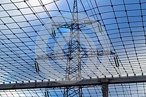 Protective mesh under the high-voltage line, safety and maintenance of power grids