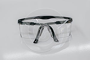 Protective Safety eyeglasses. Equipment for work with chemicals. Plastic safety eyewear.