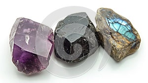 Protective trio of Amethyst, Black Tourmaline, and Labradorite, offering a sense of security and mystique on a white