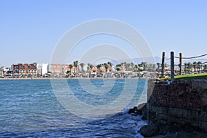 The protective wall in the sea from the destruction of the shore from the waves