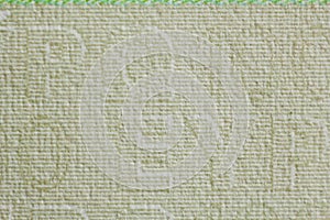 Protective watermark on a hundred euro bill in macro. protection against counterfeiting of banknotes. hologram. detail of paper