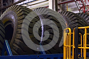 The protector of a large rubber wheel. Huge rubber tire career dump trucks, mining trucks from the tipper.