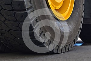 The protector of a large rubber wheel. Huge rubber tire career dump trucks, mining trucks from the tipper